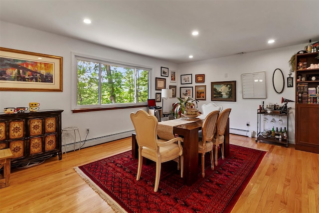 2358 Maple Ave, Cortlandt Manor, NY 10567 - dining area featuring a baseboard heating unit, light wood-type flooring, and recessed lighting
