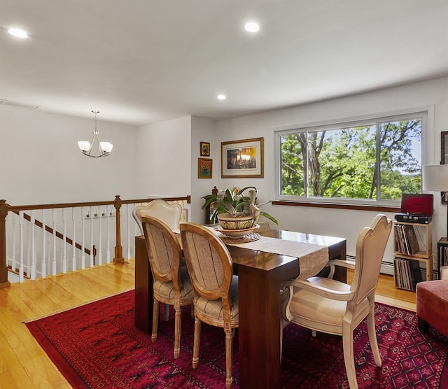 2358 Maple Ave, Cortlandt Manor, NY 10567 - dining room with wood finished floors, recessed lighting, a chandelier, and baseboard heating
