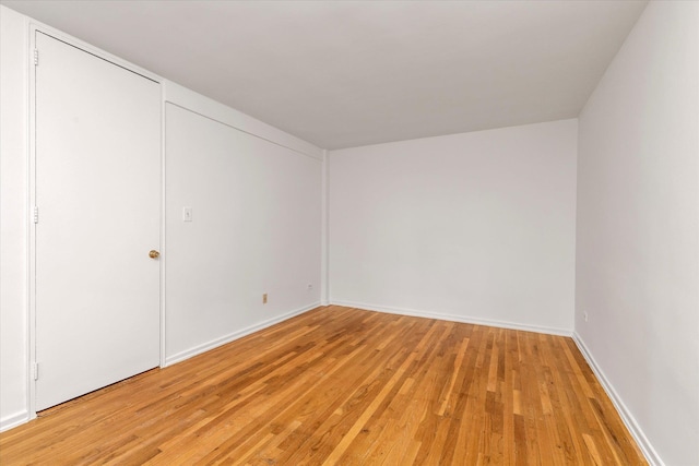 35-20 Leverich St Unit A 504, Jackson Heights, NY 11372 - unfurnished room with baseboards and light wood-style floors