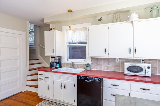 3 Druid Hill Rd, Port Jefferson, NY 11777 - kitchen featuring dishwasher, a sink, and white cabinetry