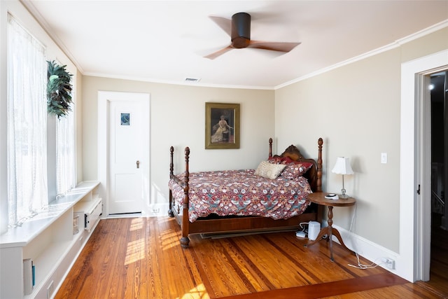 3 Druid Hill Rd, Port Jefferson, NY 11777 - bedroom with ornamental molding, wood finished floors, and a ceiling fan