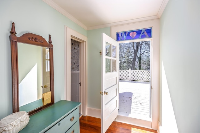 3 Druid Hill Rd, Port Jefferson, NY 11777 - entryway featuring ornamental molding, dark wood-type flooring, and baseboards