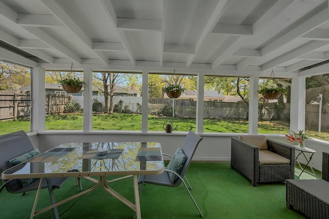 sunroom / solarium with plenty of natural light and beam ceiling
