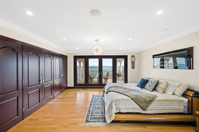 1101 Harbor Rd, Hewlett, NY 11557 - bedroom with recessed lighting, light wood-style flooring, crown molding, and french doors