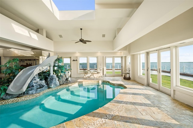 1101 Harbor Rd, Hewlett, NY 11557 - indoor pool featuring a water view and ceiling fan