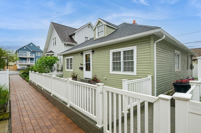 3 September Walk, Long Beach, NY 11561 - view of home's exterior with roof with shingles