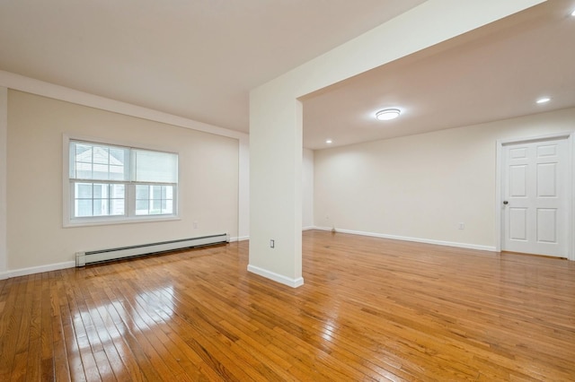 3 September Walk, Long Beach, NY 11561 - spare room featuring baseboard heating, light wood-style flooring, and baseboards