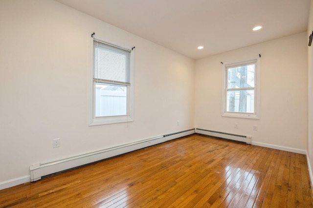 3 September Walk, Long Beach, NY 11561 - unfurnished room with wood-type flooring, baseboards, recessed lighting, and a baseboard radiator