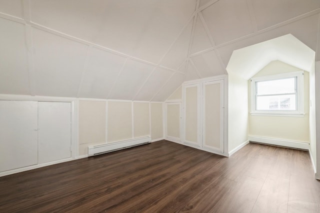 3 September Walk, Long Beach, NY 11561 - additional living space featuring baseboard heating, vaulted ceiling, and dark wood-style flooring