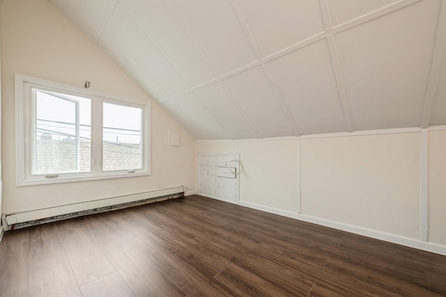 3 September Walk, Long Beach, NY 11561 - additional living space with a baseboard heating unit, vaulted ceiling, and dark wood-type flooring
