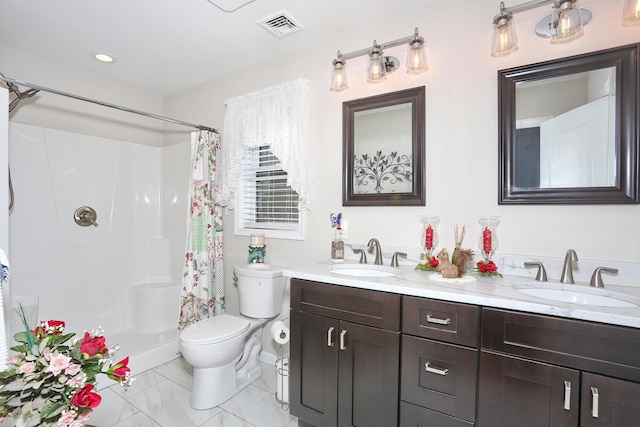 bathroom featuring a sink, visible vents, toilet, and a shower with shower curtain