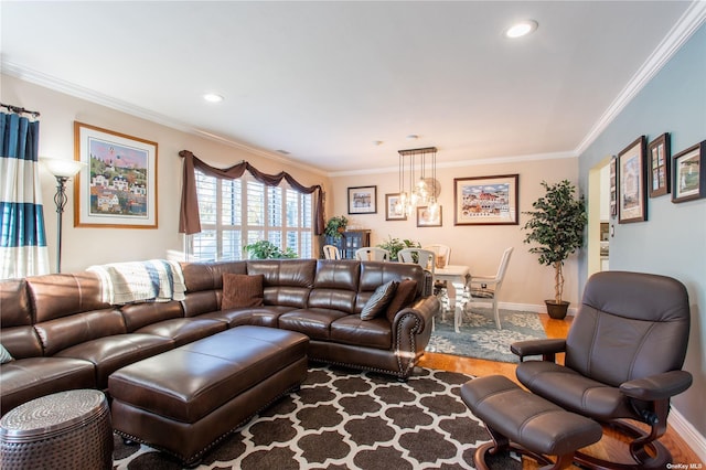 60 Erin Ln Unit 60, East Setauket, NY 11733 - living area featuring wood finished floors, crown molding, and recessed lighting