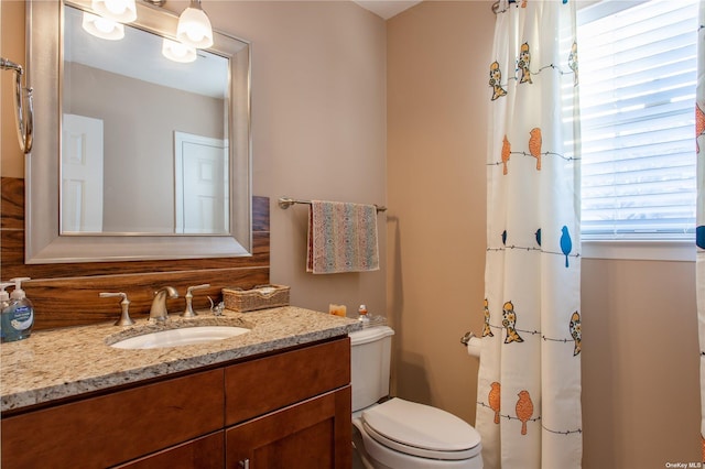 60 Erin Ln Unit 60, East Setauket, NY 11733 - bathroom with vanity, plenty of natural light, and curtained shower