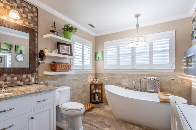 60 Erin Ln Unit 60, East Setauket, NY 11733 - full bathroom featuring tile walls, vanity, a freestanding bath, crown molding, and marble finish floors