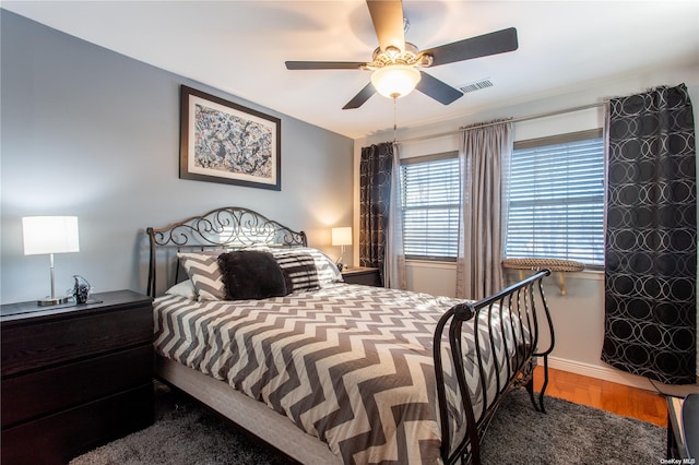60 Erin Ln Unit 60, East Setauket, NY 11733 - bedroom featuring wood finished floors and a ceiling fan