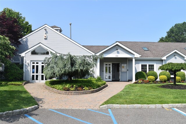 60 Erin Ln Unit 60, East Setauket, NY 11733 - view of building exterior with uncovered parking