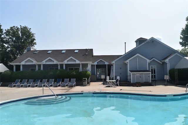 60 Erin Ln Unit 60, East Setauket, NY 11733 - community pool featuring a patio