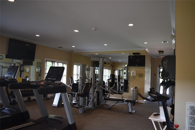 60 Erin Ln Unit 60, East Setauket, NY 11733 - gym with ornamental molding, recessed lighting, and carpet floors