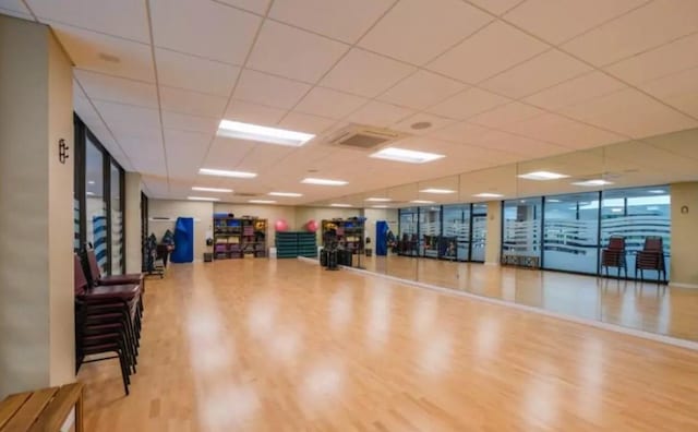 2 Bay Club Dr Unit 6Z4, Bayside, NY 11360 - workout area featuring wood finished floors and a drop ceiling