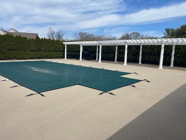 703 Pebble Beach Path, Riverhead, NY 11901 - view of swimming pool with a pergola and a patio area