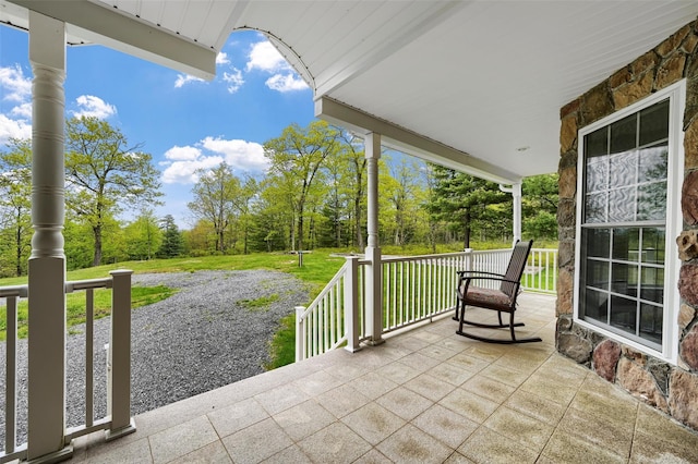 view of patio featuring a porch