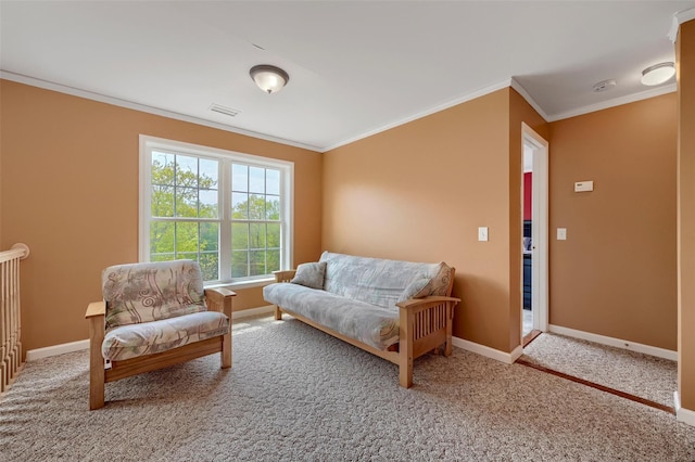 living area with ornamental molding, baseboards, carpet, and visible vents