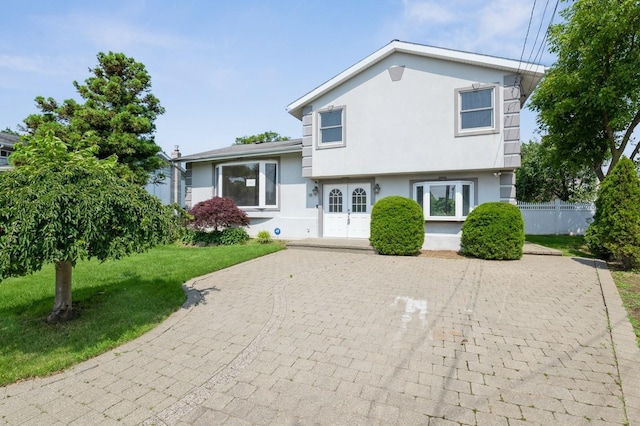 18 Oxford Rd, East Rockaway, NY 11518 - split level home with stucco siding and french doors