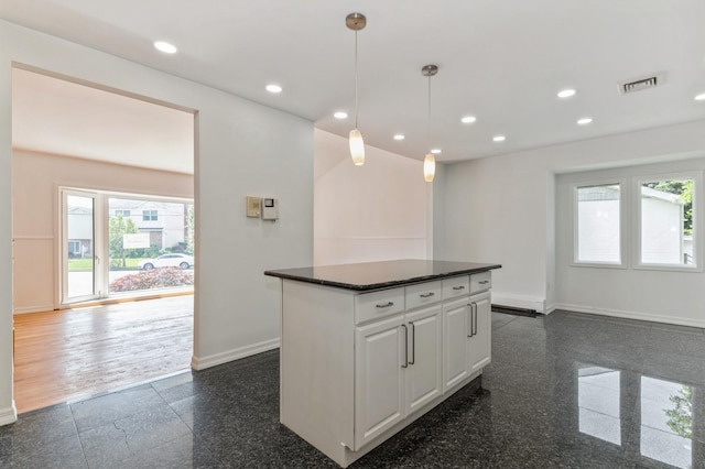 18 Oxford Rd, East Rockaway, NY 11518 - kitchen featuring granite floors, a kitchen island, white cabinetry, pendant lighting, and recessed lighting