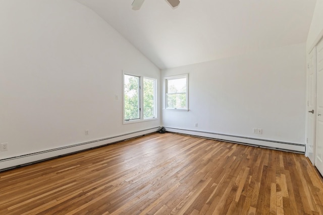 18 Oxford Rd, East Rockaway, NY 11518 - unfurnished room with wood finished floors, a baseboard heating unit, high vaulted ceiling, and ceiling fan