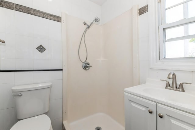 18 Oxford Rd, East Rockaway, NY 11518 - bathroom featuring tile walls, a stall shower, and vanity