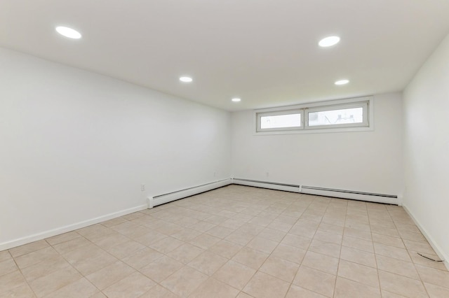 18 Oxford Rd, East Rockaway, NY 11518 - empty room with recessed lighting and a baseboard heating unit