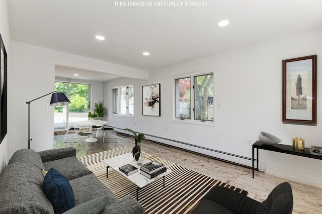 18 Oxford Rd, East Rockaway, NY 11518 - living room featuring a baseboard heating unit and recessed lighting
