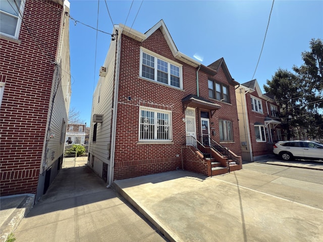 multi unit property featuring brick siding