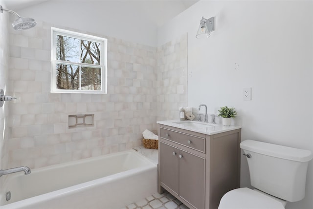 bathroom with a shower, vanity, a bath, and toilet