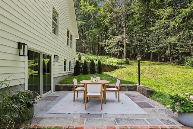 view of patio with outdoor dining area