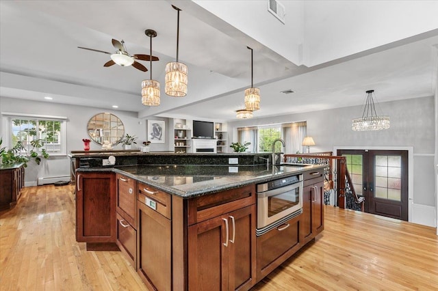 61 Beatrice Ln, Old Bethpage, NY 11804 - kitchen featuring a chandelier, a sink, baseboard heating, light wood finished floors, and recessed lighting