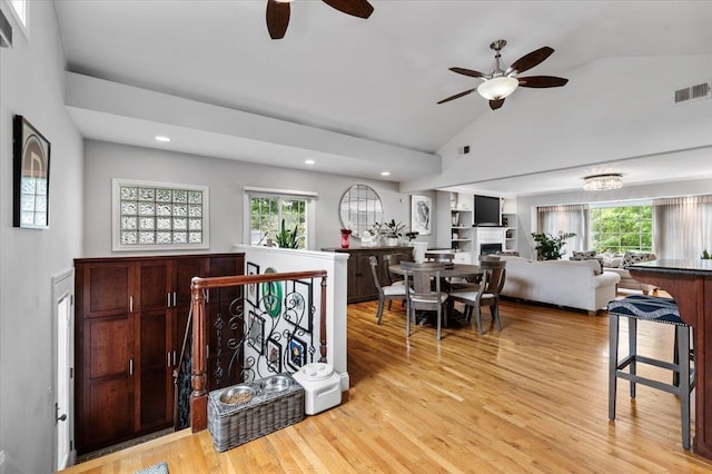 61 Beatrice Ln, Old Bethpage, NY 11804 - dining area with a ceiling fan, vaulted ceiling, light wood finished floors, and recessed lighting