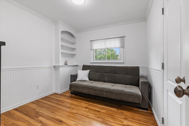 61 Beatrice Ln, Old Bethpage, NY 11804 - sitting room featuring wainscoting, wood finished floors, and ornamental molding