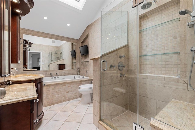 61 Beatrice Ln, Old Bethpage, NY 11804 - bathroom featuring a skylight, a garden tub, tile patterned flooring, vanity, and a shower stall
