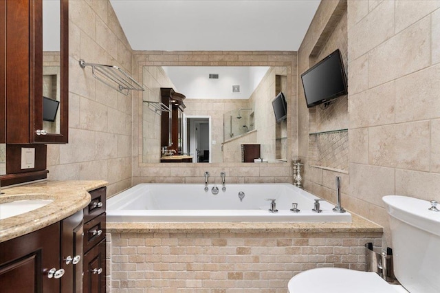 61 Beatrice Ln, Old Bethpage, NY 11804 - full bath featuring tile walls, toilet, vanity, a garden tub, and tiled shower