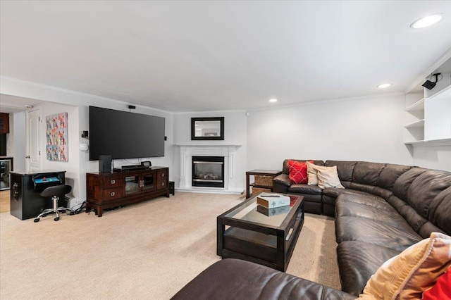 61 Beatrice Ln, Old Bethpage, NY 11804 - living room featuring light colored carpet, a glass covered fireplace, recessed lighting, and crown molding