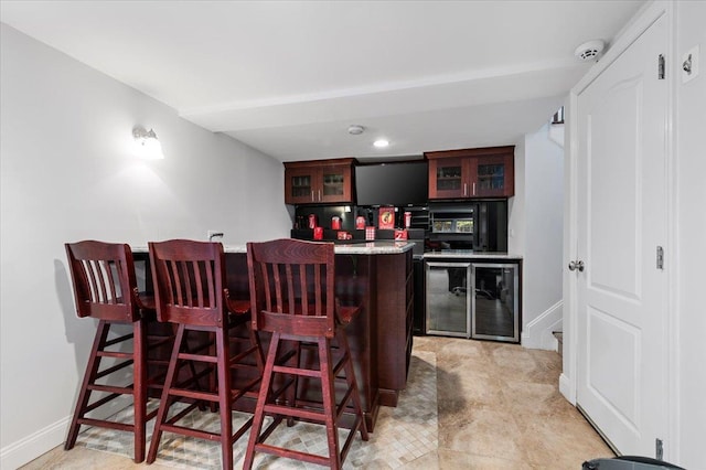 61 Beatrice Ln, Old Bethpage, NY 11804 - indoor wet bar with baseboards and recessed lighting