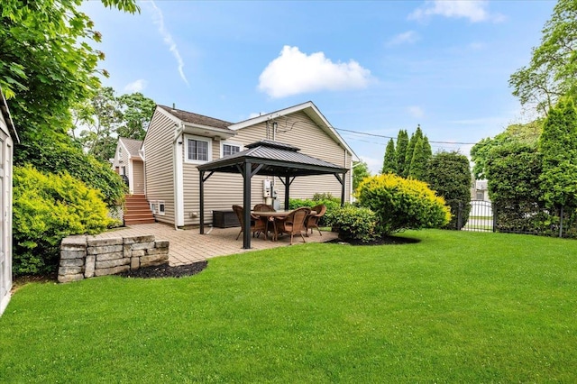 61 Beatrice Ln, Old Bethpage, NY 11804 - rear view of house with a gazebo and a patio area