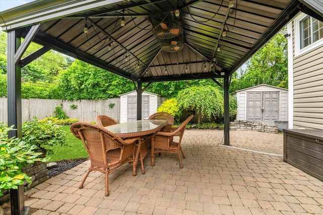 61 Beatrice Ln, Old Bethpage, NY 11804 - fenced backyard featuring a gazebo, outdoor dining area, and a patio