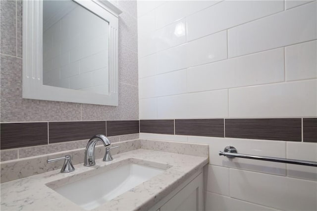 14 N Chatsworth Ave Unit 7A, Larchmont, NY 10538 - bathroom featuring vanity, tasteful backsplash, and tile walls