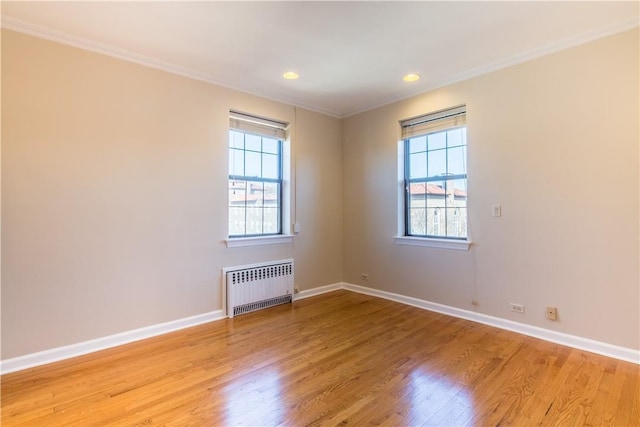 14 N Chatsworth Ave Unit 7A, Larchmont, NY 10538 - unfurnished room featuring radiator, ornamental molding, light wood finished floors, baseboards, and recessed lighting