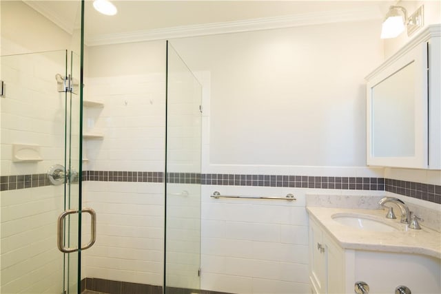 14 N Chatsworth Ave Unit 7A, Larchmont, NY 10538 - bathroom featuring ornamental molding, a stall shower, vanity, and wainscoting