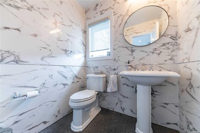 half bathroom with toilet