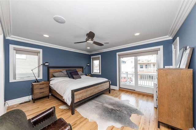 bedroom with multiple windows, access to exterior, baseboards, and ornamental molding