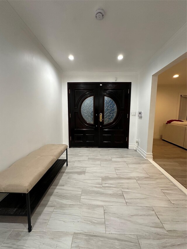 121 W Seaman Ave, Freeport, NY 11520 - foyer entrance featuring recessed lighting, baseboards, and crown molding